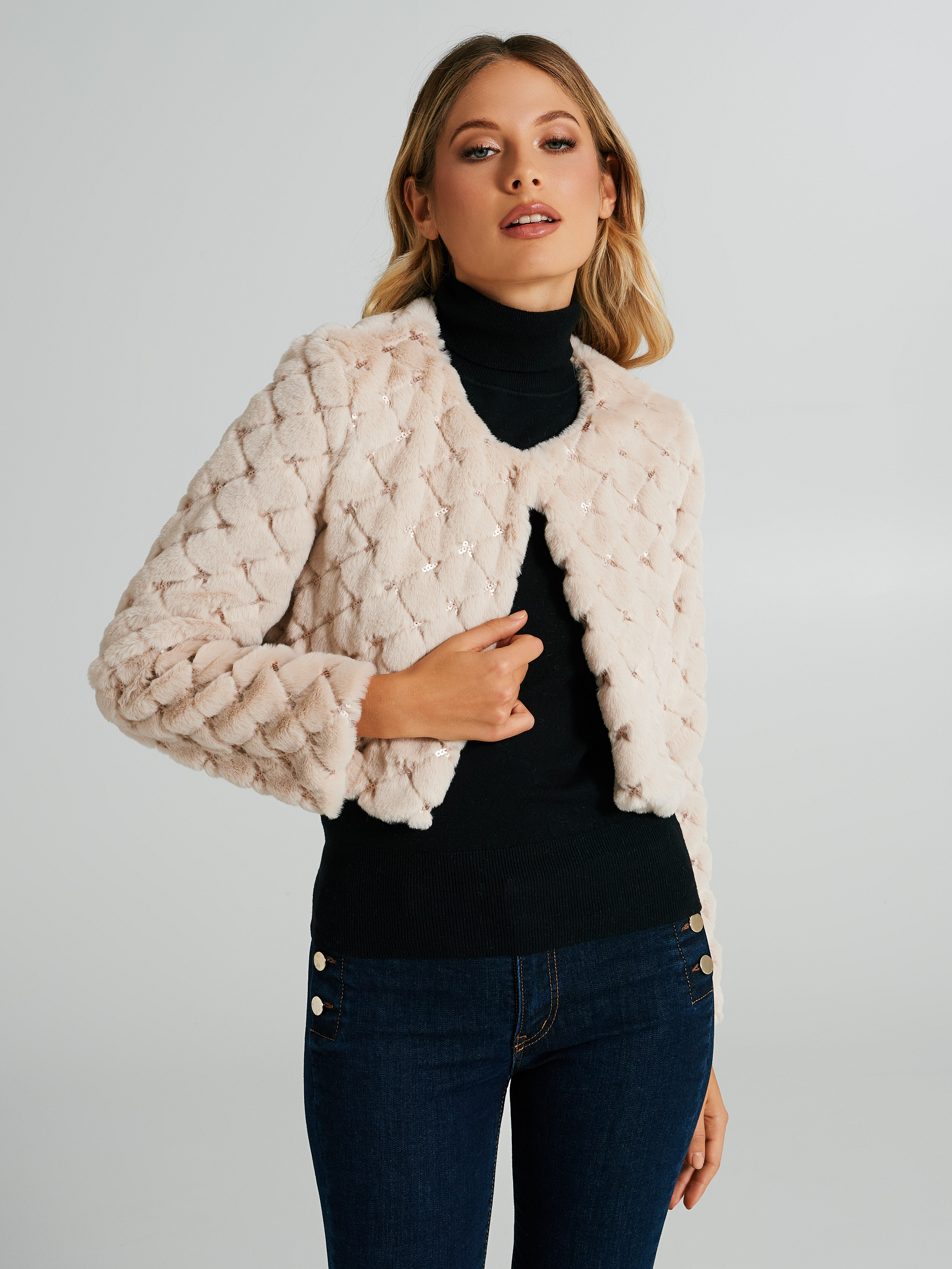 Quilted fur coat with sequins