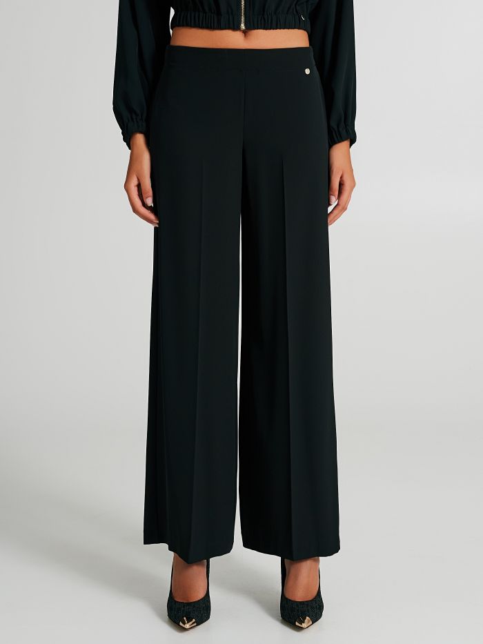Pantaloni in tessuto tecnico con piega  Rinascimento