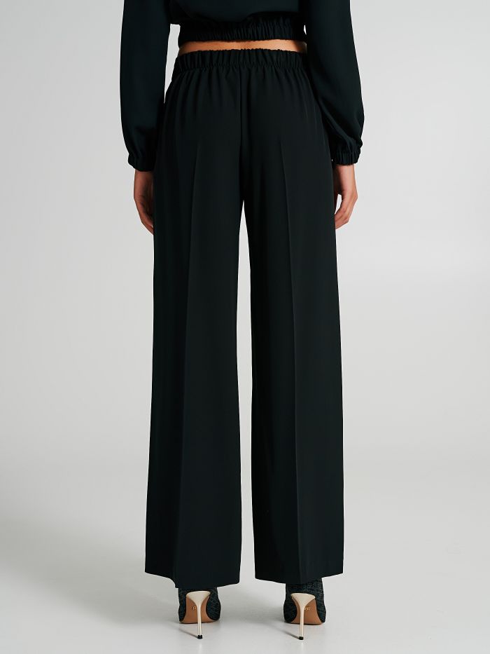 Pantaloni in tessuto tecnico con piega  Rinascimento