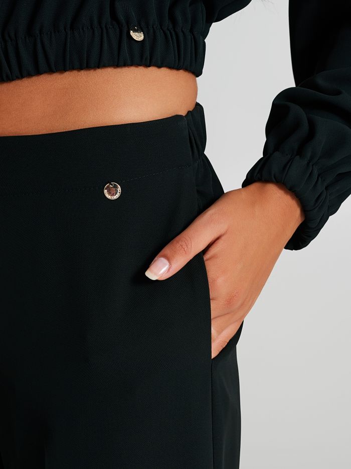 Pantaloni in tessuto tecnico con piega  Rinascimento