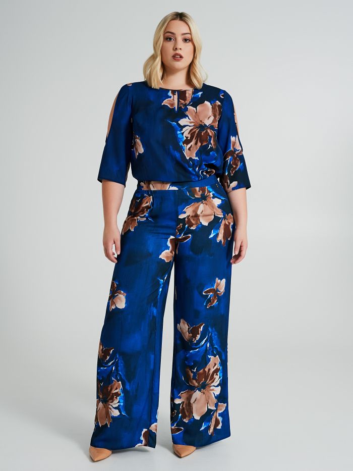Curvy palazzo trousers with a floral pattern   Rinascimento