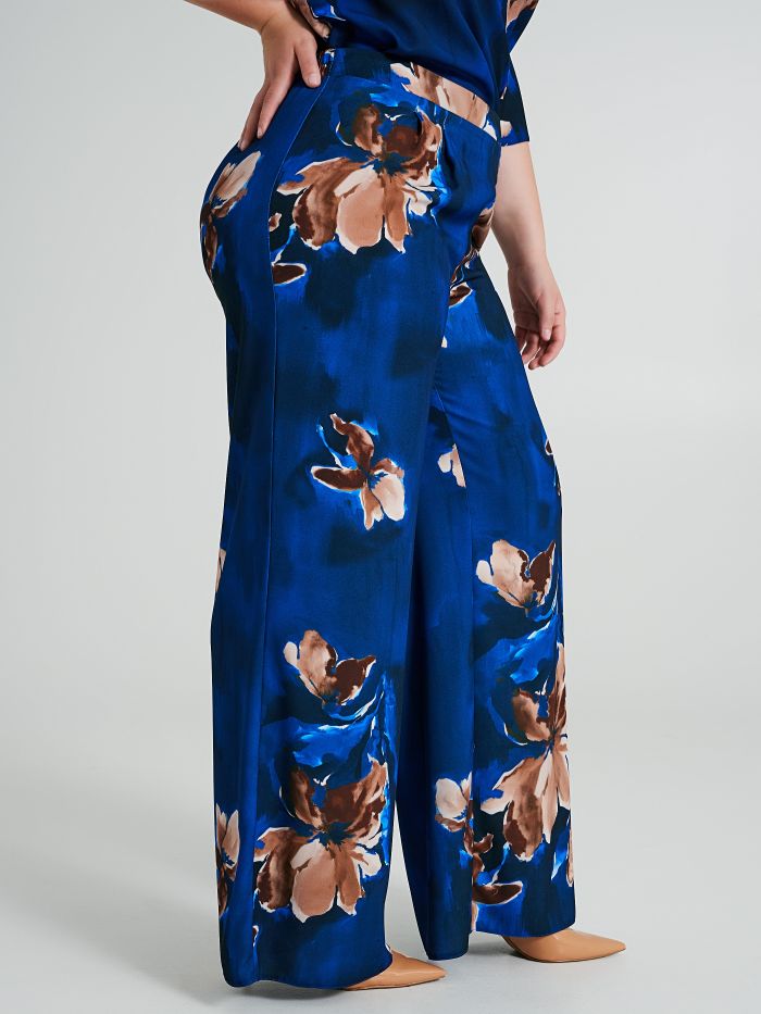 Curvy palazzo trousers with a floral pattern  Rinascimento
