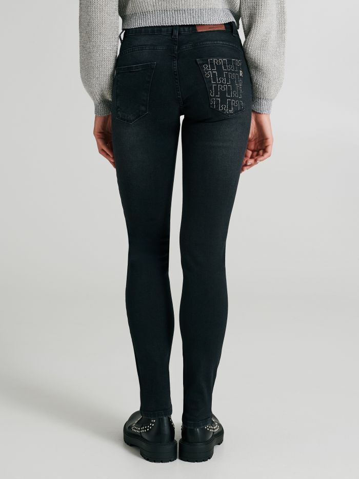 Skinny jeans with rhinestone pocket  Rinascimento