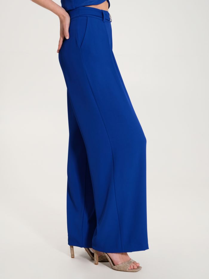 Flowy trousers with buckle-style chain  in_i7
