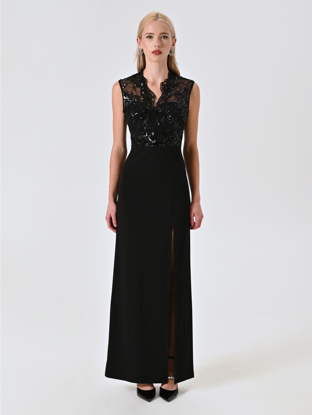 Vestido negro con cuerpo de lentejuelas det_1
