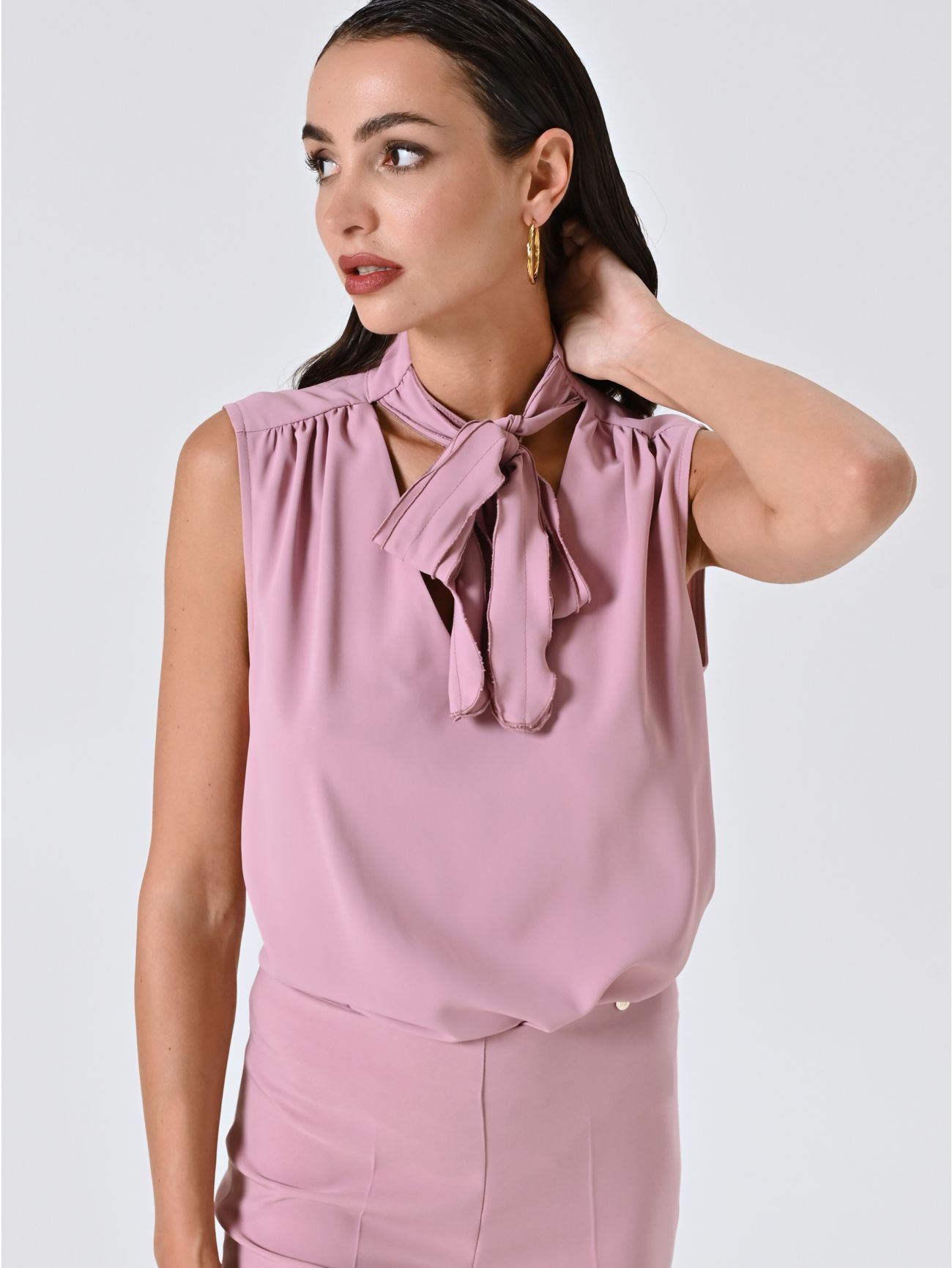 Top rosa con lazo in_i7