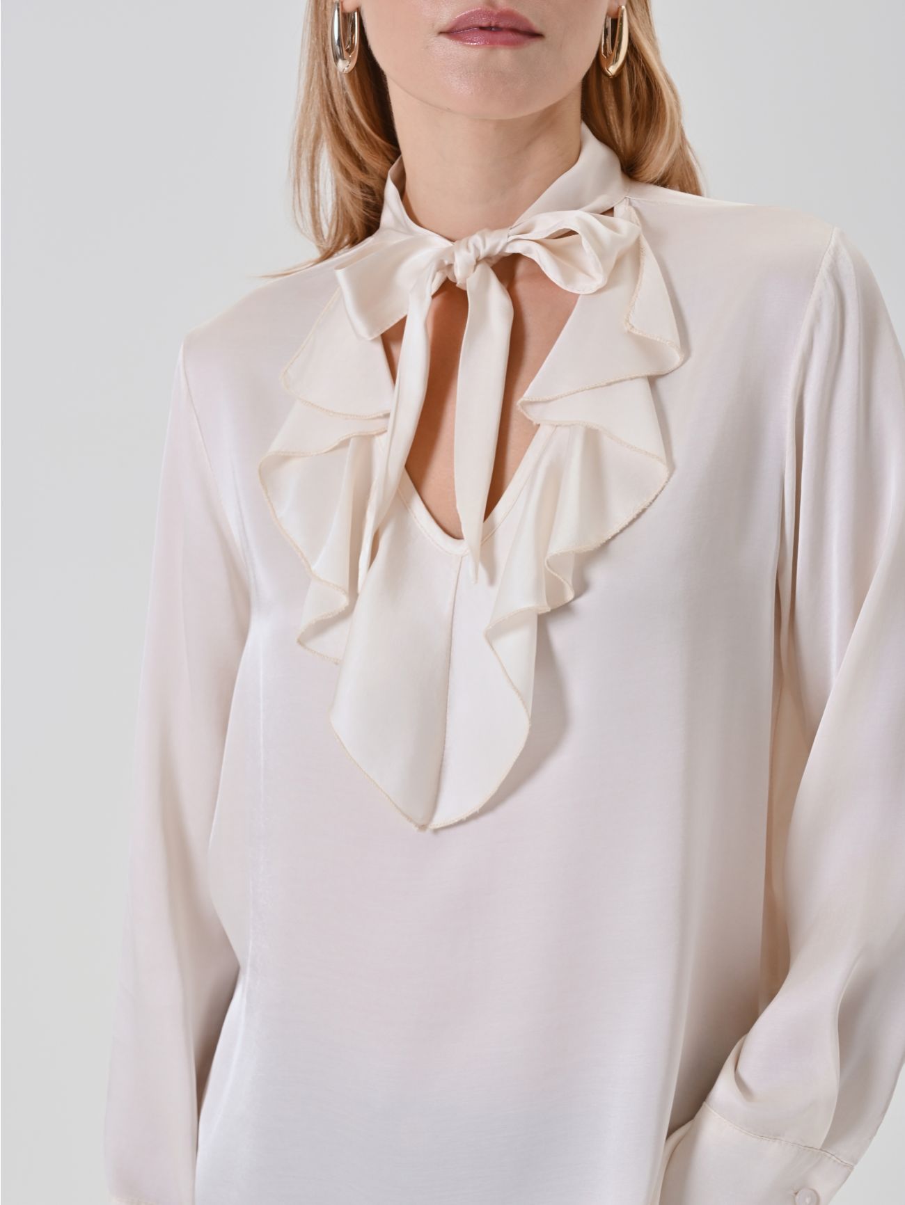 Ivory Ruffled V-Neck Blouse in_i5