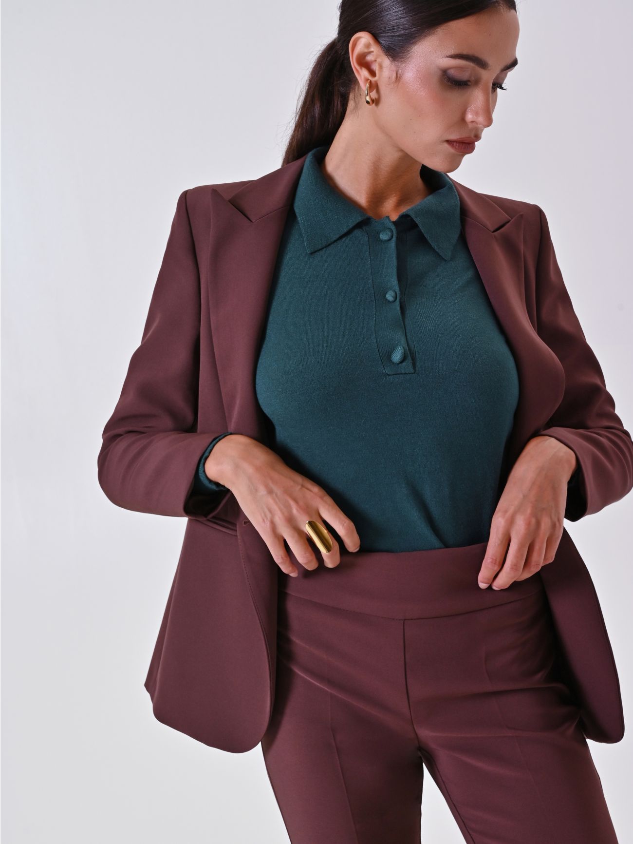 Polo vert en maille avec boutons recouverts de tissu sp_e1