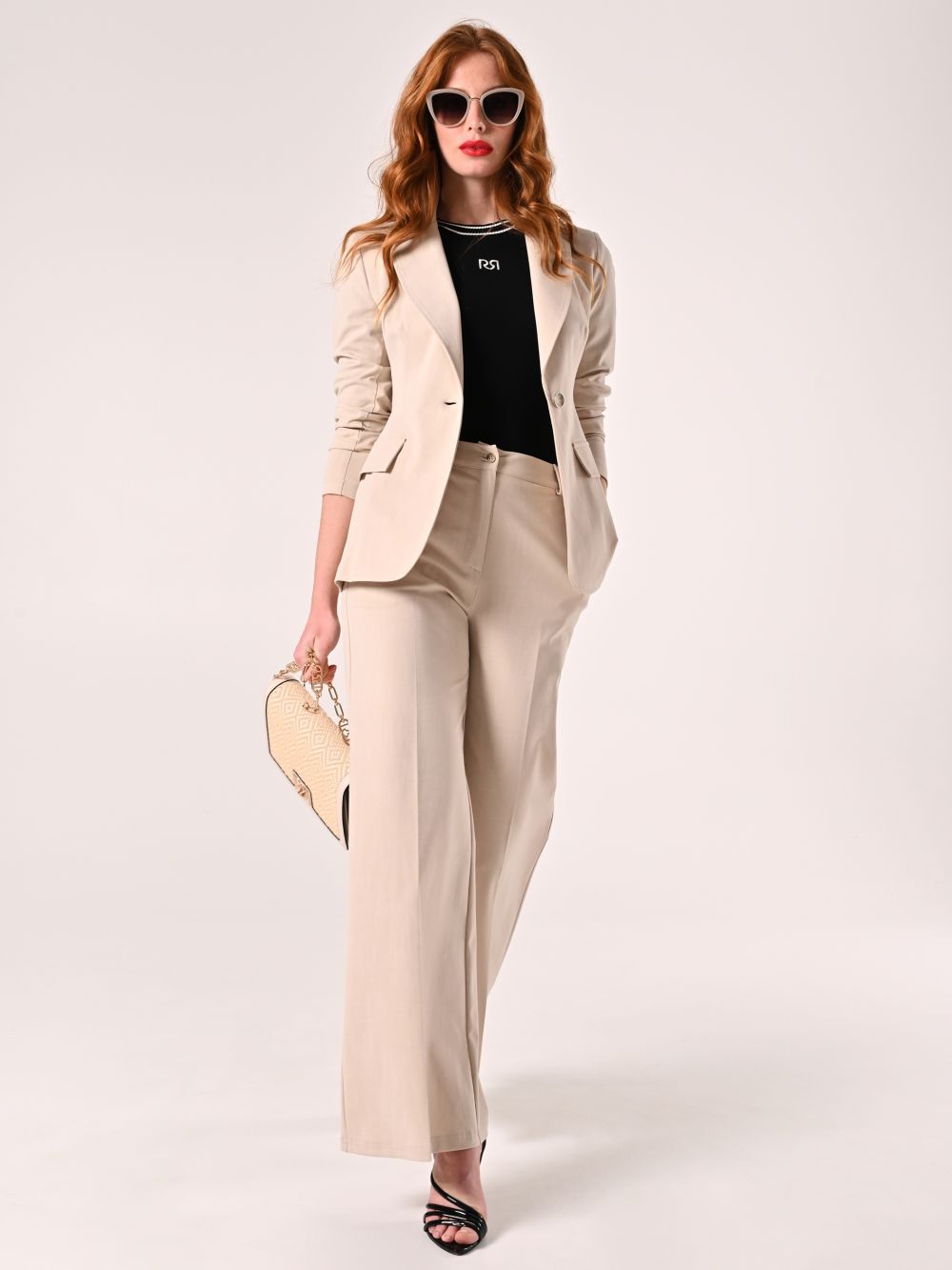 Pantaloni Beige in Tessuto Operato