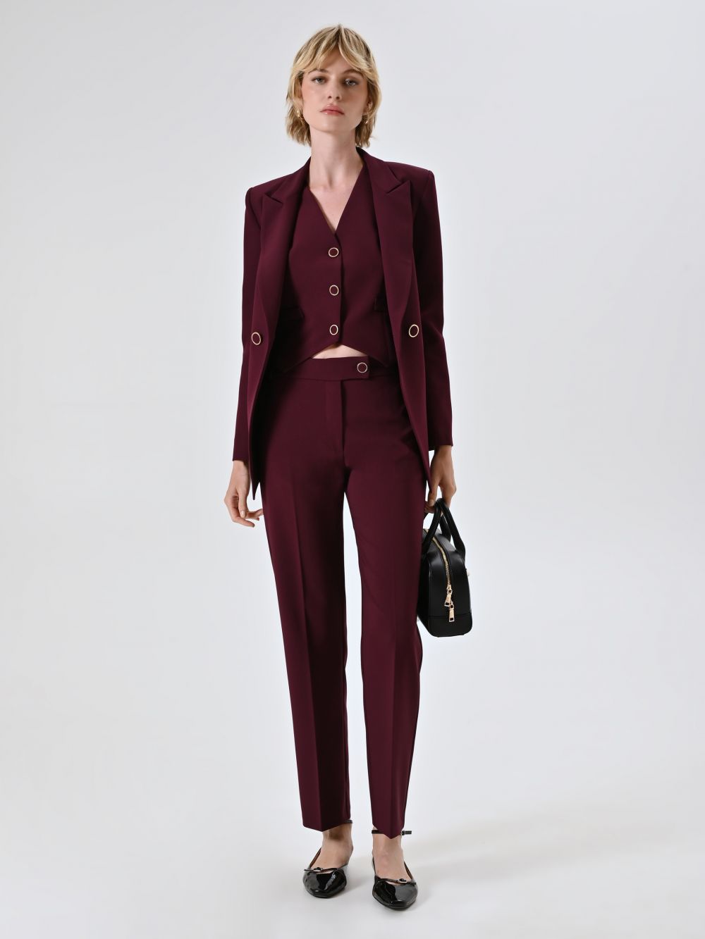 Pantaloni Bordeaux Skinny in Tessuto Tecnico
