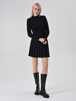Black Dress with Pleated Skirt in_i7