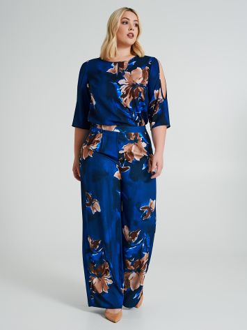 Curvy palazzo trousers with a floral pattern  Rinascimento