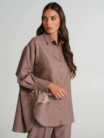 Oversized shirt with feathers