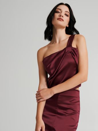 One-shoulder satin top with a bow