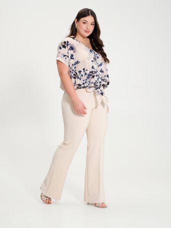 Curvy flared trousers in technical fabric