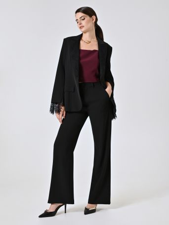 Pantalon noir en tissu crêpe cady