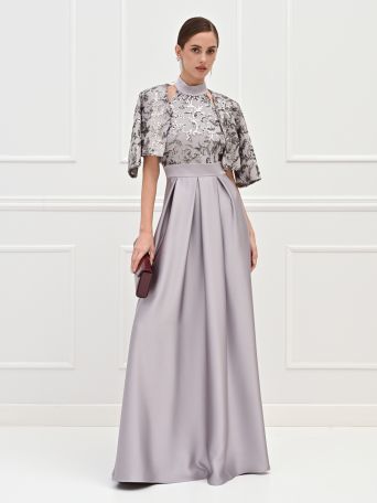Abito lungo argento con corpetto in paillettes e gonna in raso