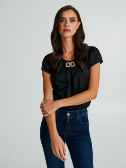 Blusa boxy con dettaglio gioiello  Rinascimento