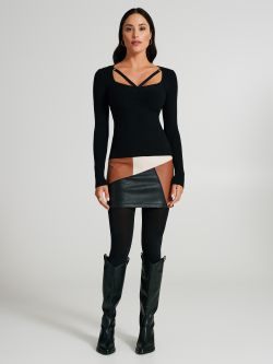 Maglia con cut-out e borchie  Rinascimento